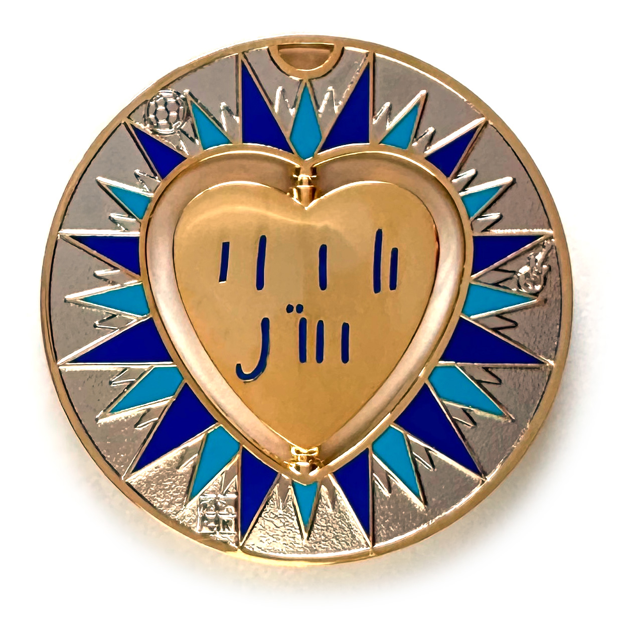 gulas geocoin, gold and nickel, a geocoin with a heart in the center