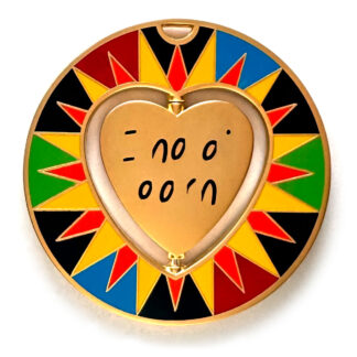 gulas geocoin, matte gold, a geocoin with a heart in the center