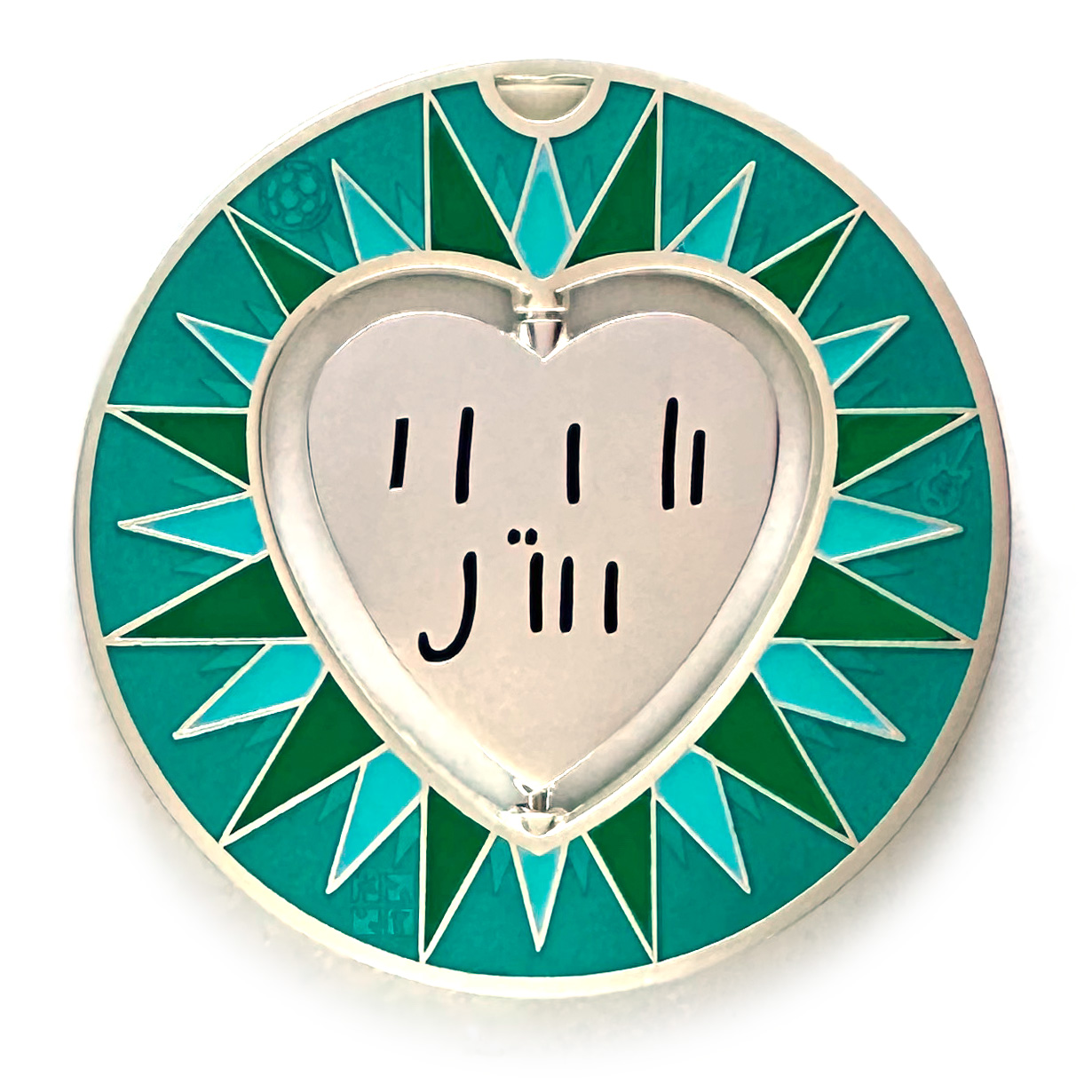 gulas geocoin, matte silver, a geocoin with a heart in the center
