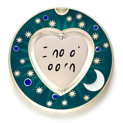 gulas geocoin, matte silver, a geocoin with a heart in the center