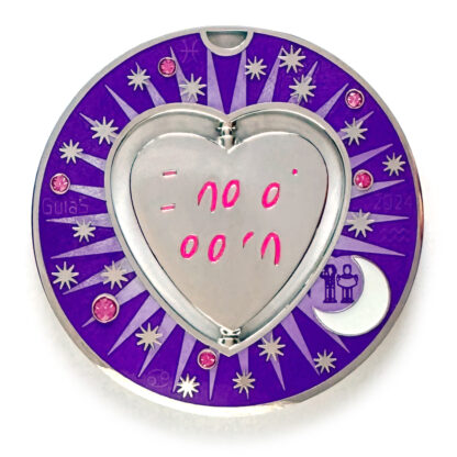 gulas geocoin, nickel, a geocoin with a heart in the center